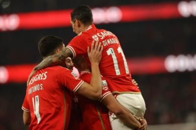 Celebratory Moment: Di María and Teammates Embrace after Victory