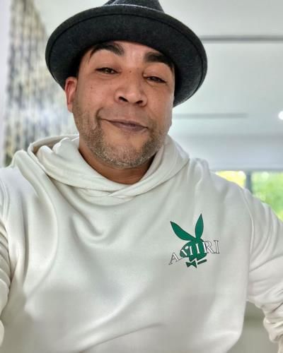 Don Omar's Sunday Snapshot with White Outfit and Black Hat