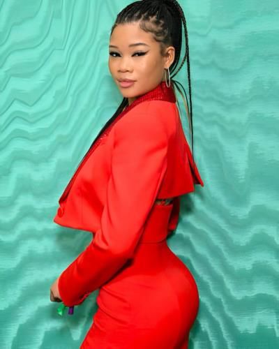 Storm Reid's Stunning Red Ensemble Demands Attention and Timeless Elegance
