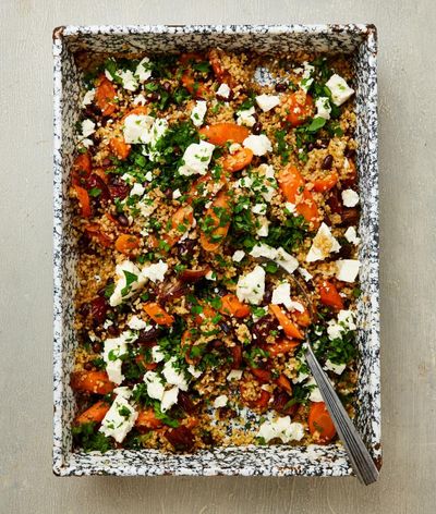 Rukmini Iyer’s quick and easy spiced roast carrots with feta, dates, bulgur and beans – recipe