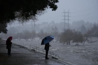 Los Angeles River Swells Amid Heavy Rain, Concerns for Homeless