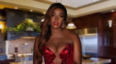 Amara La Negra: Radiating Confidence and Elegance in Red Dress