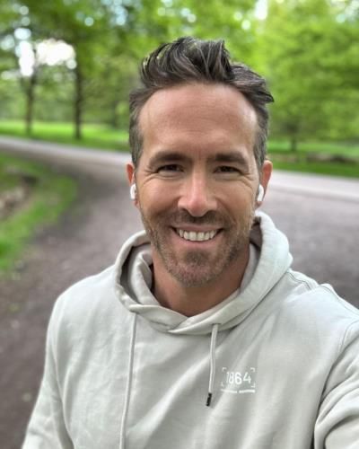 Ryan Reynolds: Embracing Serenity on a Tranquil Green Track