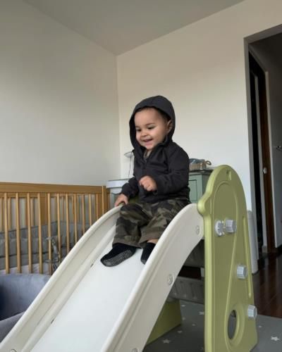 Excitement Unleashed: A Child Ready to Slide into Adventure