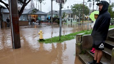 Up First briefing: Record-breaking rain in California, Dartmouth brings back SAT, ACT