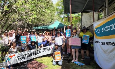 ‘Nowhere else to go’: protesters rally in support of Brisbane woman refusing to leave rental home of 22 years