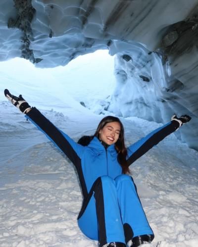 Maria Brechane Embracing Winter Beauty in Snowy Wonderland and Cave
