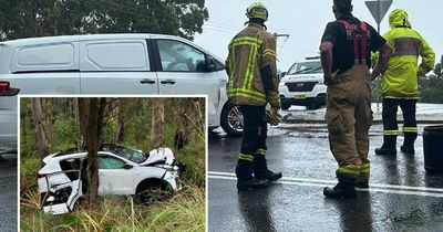 Car down an embankment at Redhead: two people taken to hospital