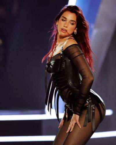 Dua Lipa shines on stage with captivating music and style