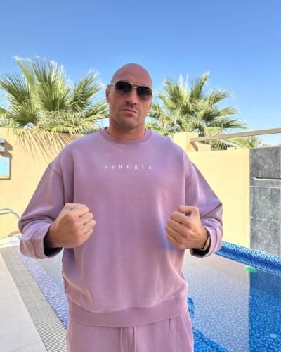 Tyson Fury Shows Off Stylish Comfort by the Poolside Pose