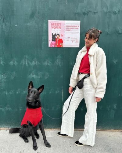 Taylor Hill and her chic black dog create a fashionable duo