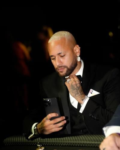 Neymar Jr: Cool Sophistication in Sleek Black Attire