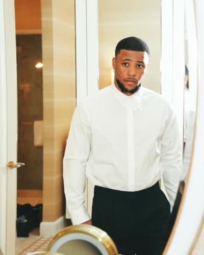 Saquon Barkley Stuns in Sharp White and Black Suit