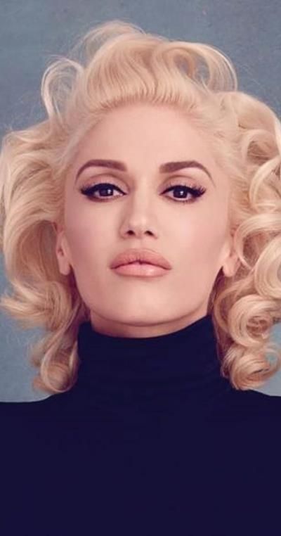 Gwen Stefani: Captivating Rockstar Glam in Electrifying Concert Photos