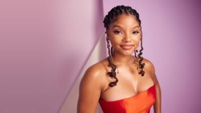 Halle Bailey flaunts post-baby body at Super Bowl with sister