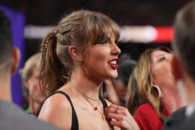 Taylor Swift’s Super Bowl boots bedazzled with Travis Kelce’s number 87 are perfection