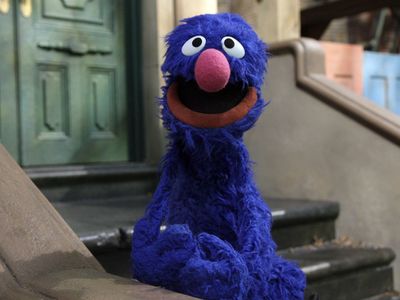 Grover the Muppet says he's a reporter. Not for long, joke his beleaguered peers