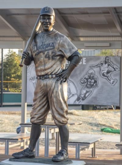 Man charged with theft and destruction of Jackie Robinson statue
