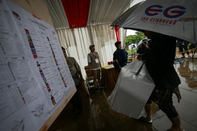 From Remote Tribal Areas To Flooded Cities, Indonesians Go To Polls