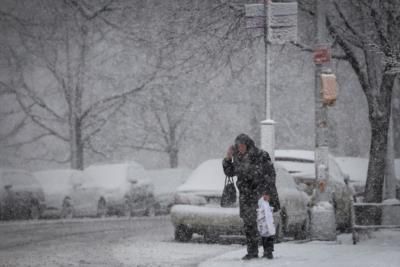 Snowstorm blankets Northeast, more storms approaching West Coast