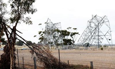 Push to weatherproof Australia’s electricity grid as 77,000 still without power in Victoria