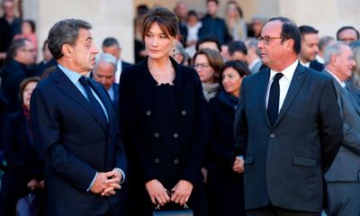 Nicolas Sarkozy’s jail term halved in illegal campaign funds case
