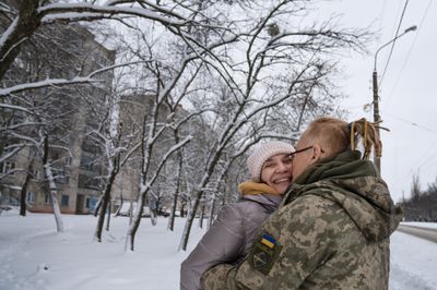Ukrainian soldiers' valentines arrive by 'train of love'