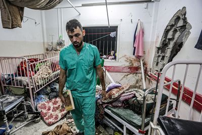 Palestinians flee as Israel orders evacuation of besieged Nasser Hospital