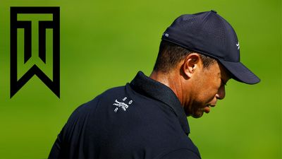 Tiger Woods turns his back on his old logo