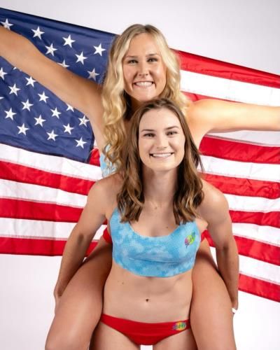 Joyful American Beach Volleyball Duo Exudes Camaraderie and Patriotism