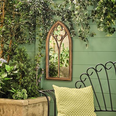Aldi's garden range will transform your outdoor space into a real-life fairytale with an £8 garden mirror and an arch