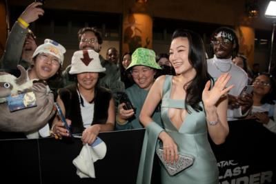 Arden Cho Shines at Premiere Event in Elegant Light Grey Dress