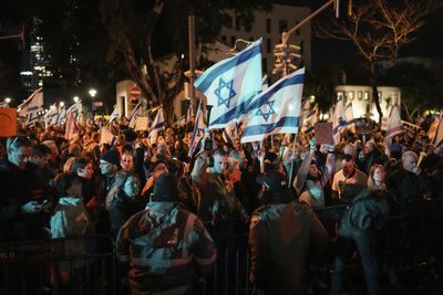 Israel’s Netanyahu dismisses calls for early election as thousands protest