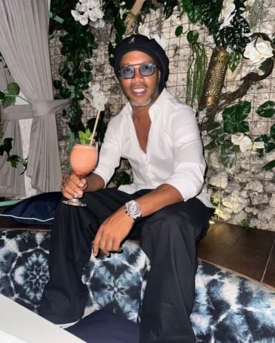 Ronaldinho Radiates Joy While Enjoying Fresh Juice in Sunshine