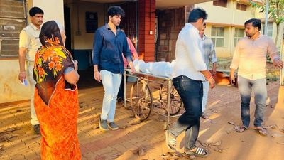 Social workers help poor woman cremate her son