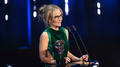 Gillian Anderson skips the red carpet to reveal another eye-catching look on stage at the BAFTAs