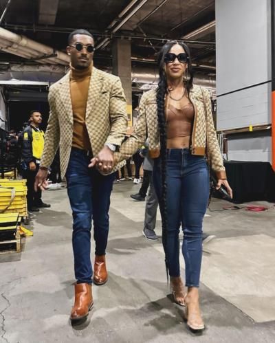Bianca Belair and Husband Display Fashionable Unity at Fight Event
