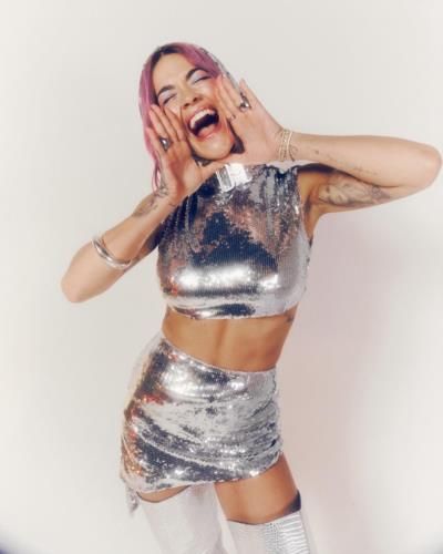 Rita Ora Stuns Fans with Glamour and Confidence in Photoshoot