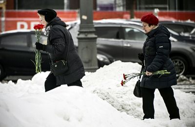 Navalny Tributes Paid At Moscow's 'Wall Of Grief'