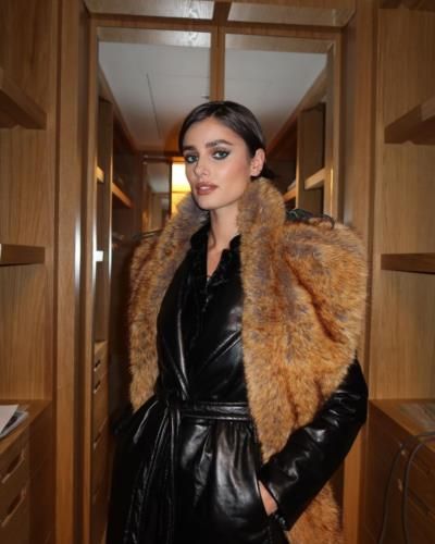 Taylor Hill Stuns In Elegant Black Outfit With Fur Accent