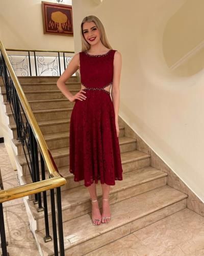 Ivanna Mcmahon Radiates Elegance In Vibrant Red Dress