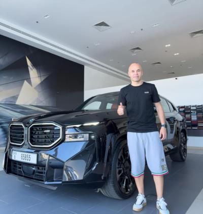 Andrés Iniesta Exuding Elegance Next To Luxury Vehicle