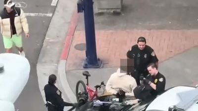 Bemused San Diego police issue Apple Vision Pro warning — Pedestrian wandering past arrest scene might be the best meme yet