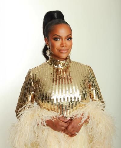 Kandi Burruss Radiates Glamour In Stunning Golden Dress