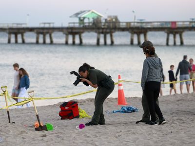 A girl dies after a sand hole on a Florida beach collapses