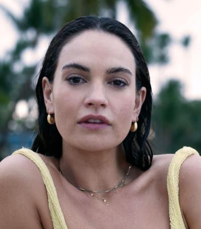 Lily James Radiates Summer Joy In Stunning Beach…