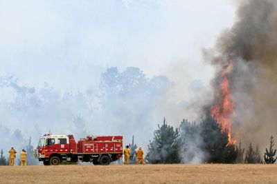 Victoria fires: at least three homes destroyed as authorities warn towns still under threat
