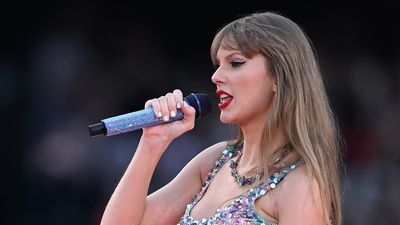 Taylor Swift sings up a storm in rain hit Sydney show