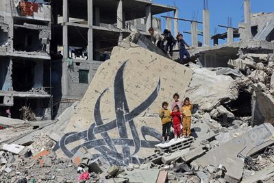 Scores Killed Overnight In Gaza, Israeli Negotiators In Paris