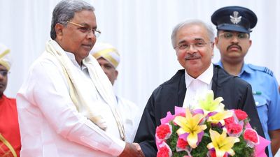 Justice Anjaria takes oath as 34th Chief Justice of Karnataka High Court